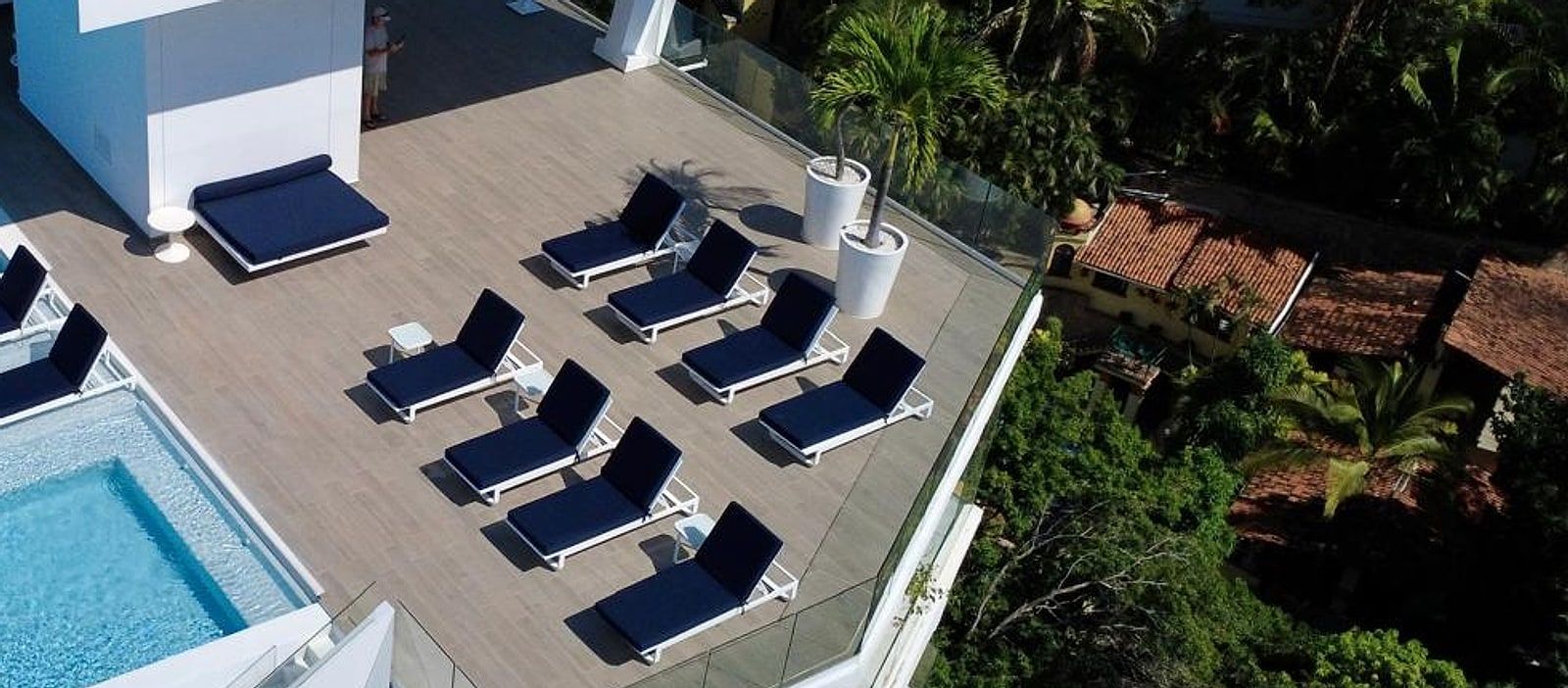 The rooftop sun deck with loungers above Conchas Chinas